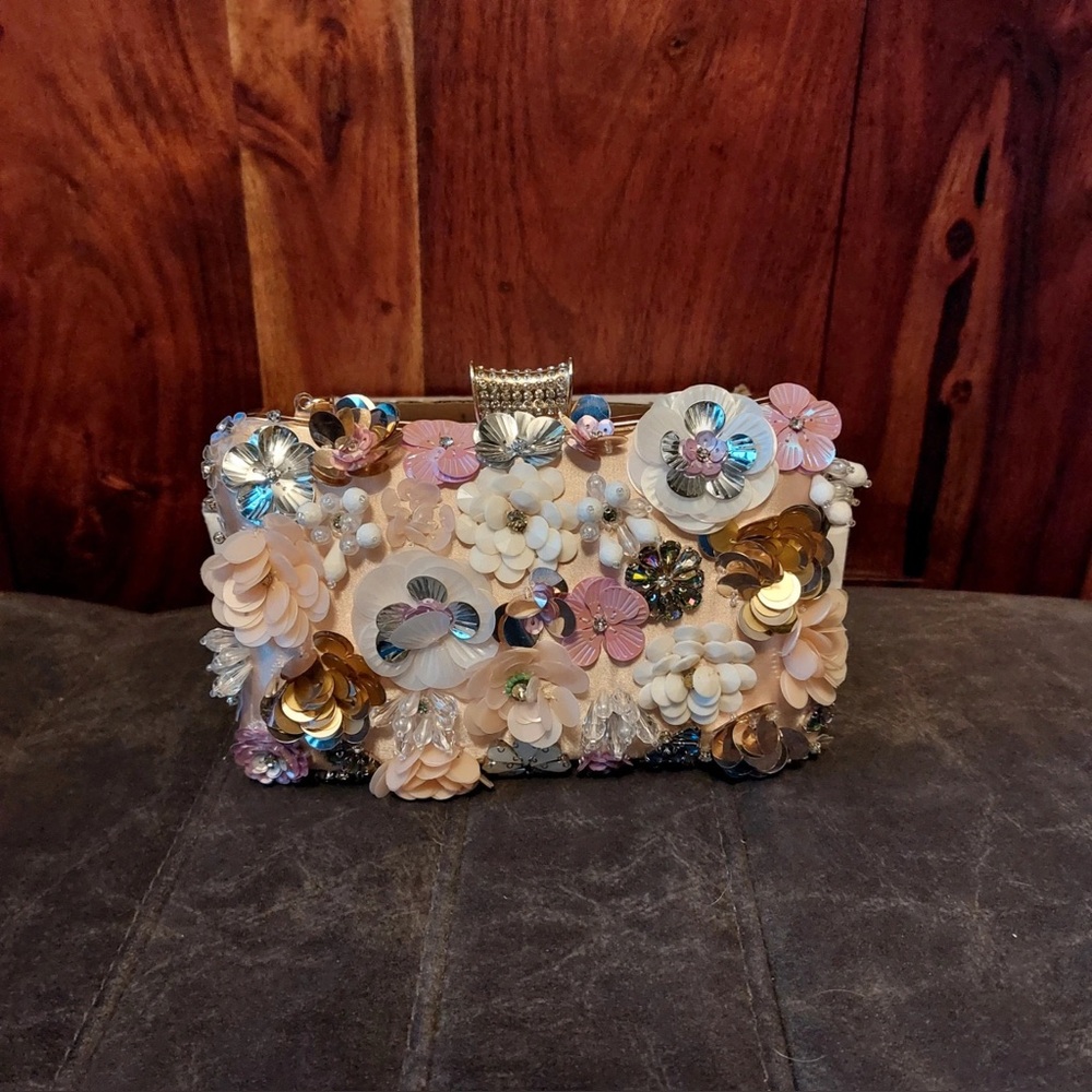 Small highly Decorated clutch bag.